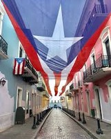 "La Calle Fortaleza" adorned with the flag of Puerto Rico