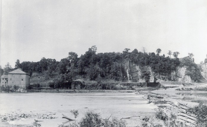 Looking across Potomac at the Cement Mill. The wooden mill dam is on the right.