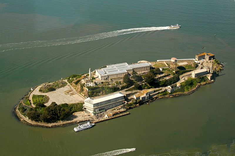 Alcatraz Island view from the West. 

"Alcatraz Island aerial view" by Ralf Baechle, Licensed under CC BY-SA 4.0 via Wikimedia Commons.  