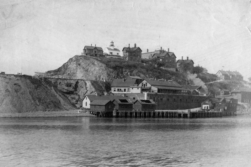 View of Alcatraz Island in 1895, showing the lighthouse and prison buildings. 