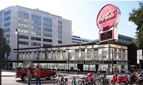 The building is known for the Coca-Cola sign on the roof.