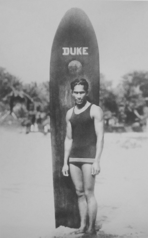 Duke Kahanamoku with his Surfboard