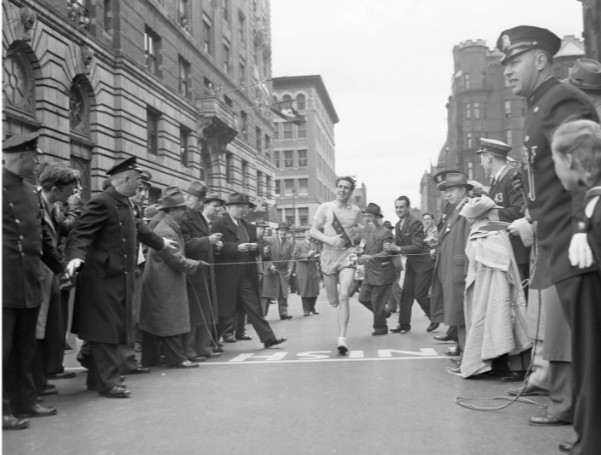 "Milkman" Joe Smith of Medford, MA, finishes the 46th Boston Marathon with a new world record