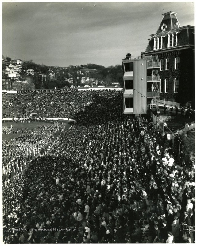 Fans pack the stands of the original Mountaineer Field for Band Day in 1965.  West Virginia & Regional History Center.