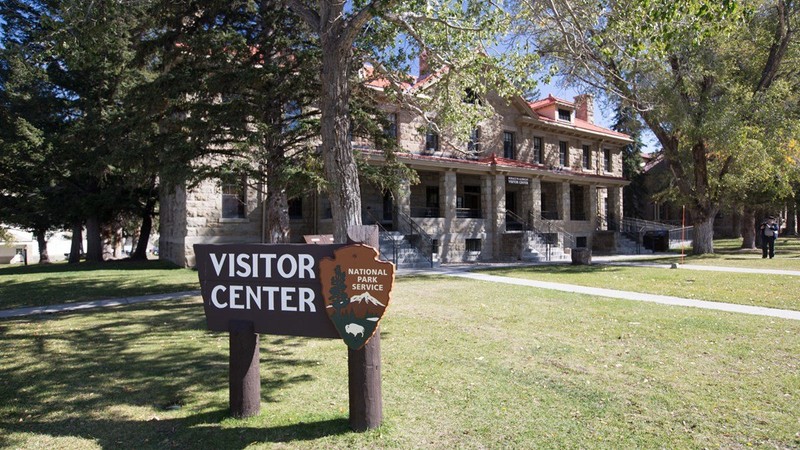 The Albright Visitors Center and Museum is located next to the Mammoth Hot Springs, one of the park's popular natural features.