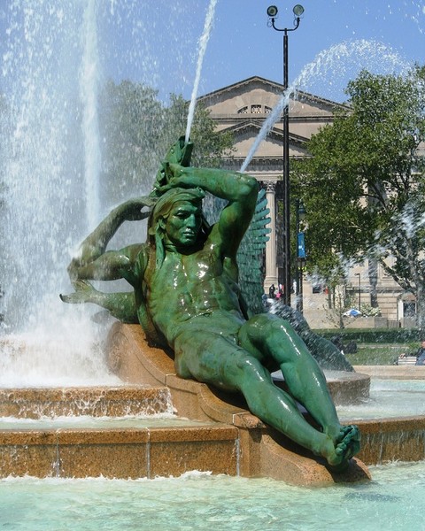 Delaware River - represented by powerful male figure reaching above his head to grasp his bow as a large pike sprays water over him