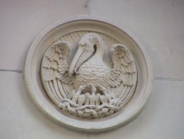 A close up of one of the bas-relief sculptures that dot the building's exterior.