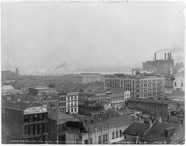 This photo from the collection of the Library of Congress shows New Orleans, with the Mississippi River in the distance, taken from the top of the Hennen Building in 1903.  