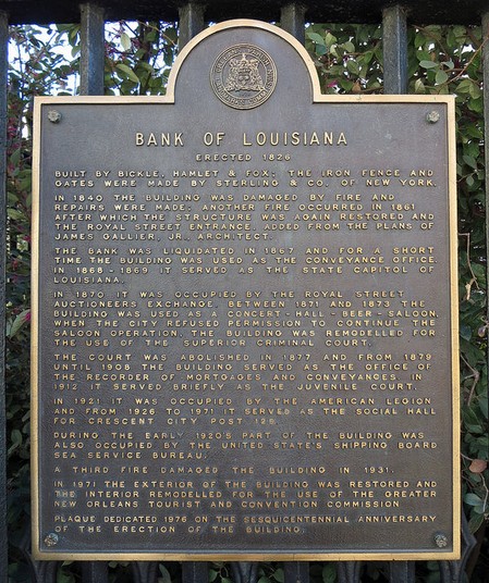 The historical marker that sits outside the old bank building describes its storied past.  