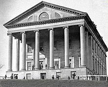 The capitol in 1865, Union soliders stand in front. 