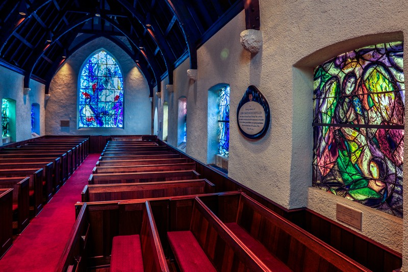 Interior of the church showing the collection of eight windows by Chagall. 