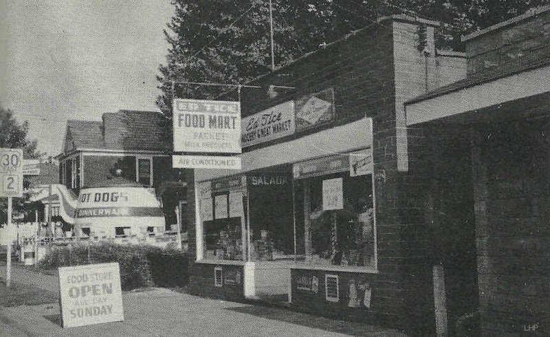 Advert for the Ed Tice Food Mart. 118 Carolina Ave, Chester, WV. In the background is the Teapot when it was used as a hot dog stand. Photo from a 1959 Polaris yearbook.