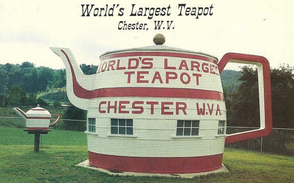 World's Largest Teapot postcard from the 1990s. 
The little teapot/creamer on the left is presently in City Hall.