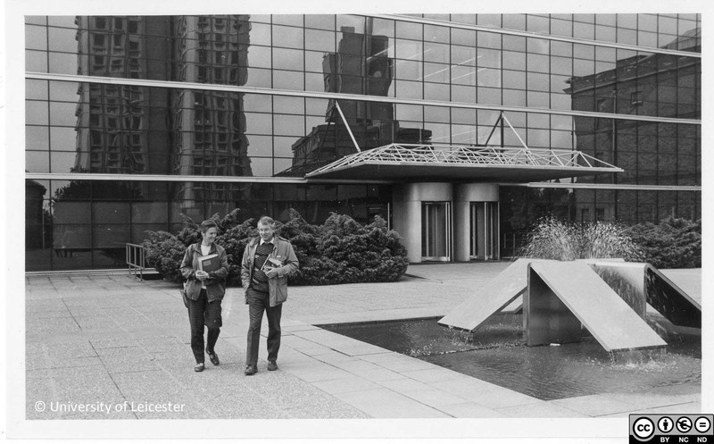 Students outside the library entrance, 1980