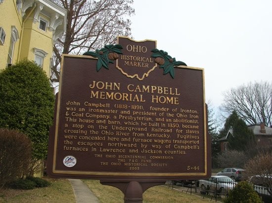 Marker for the John Campbell Memorial Home which reads, "John Campbell (1818-1891), founder of Ironton, was an ironmaker and president of the Ohio Iron & Coal Company, a Presbyterian, and an abolitionist. The house and barn, which he built in 1850, b