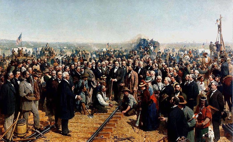 "The Last Spike." An 1881 panting of the 1869 Golden Spike being driven to officially complete the Transcontinental Railroad. The painting notably omits any Chinese-Americans, who comprised most of the Central Pacific's labor force.