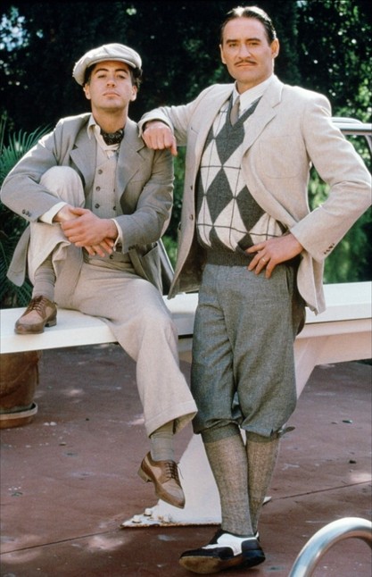 Downey Jr. (Chaplin) and Kline (Fairbanks Sr.) pose for promo shots at Hearst Castle. Posing with diving board next to one of the other outside pools at Hearst Castle. 