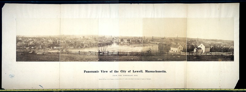 A photograph of the city of Lowell, ca. 1874. Visible here is the river that powered the mills (and served as a dumping ground for factory waste) as well as the mills themselves.