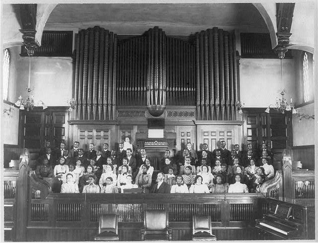 1899 photograph of choir and pipe organ inside Fisk Memorial Chapel, displayed at 1900 Paris Exhibition