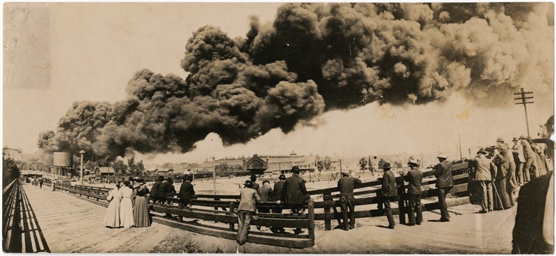 A panorama of a 1900 fire at the Central Pacific railyards near the museum's present site. The Central Pacific's passenger station can be clearly seen in the center (CA Preservation Service).