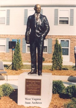 Carter G. Woodson Statue located on Hal Greer Boulevard