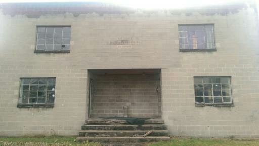 This is an apartment building owned by D.R. Hopson located at 1421 2nd avenue on Charleston's West side . The photo also shows a phrase which pays tribute to Nat Turner which reads '' Brave Courageous Intrepid'' .