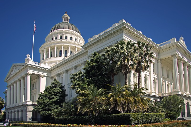 The California State Capitol Museum is housed inside the historic Capitol building, which is designed in the neoclassical style with large columns and a dome. Wikimedia, Steven Pavlov.