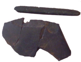 Slate pieces uncovered in the slave quarters at Thomas Jefferson’s Poplar Forest which suggest that some of the enslaved could read and write, which are now held at the Legacy Museum.