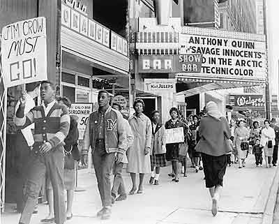 Civil Rights Demonstration. Integrating Louisville’s Downtown In 1960, young members of CORE began weekly sit-ins at segregated businesses in downtown Louisville. 
(image taken from KET Foundation)