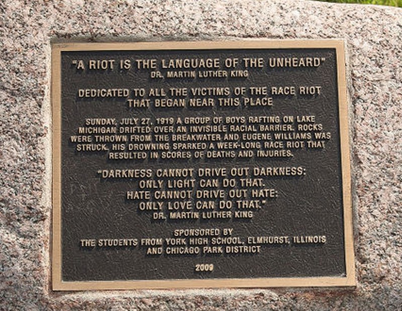 This small plaque is located on a stone and was dedicated in 2000. It is important to note that the selected quote from MLK Jr. was in reference to protests in the 1960s. 