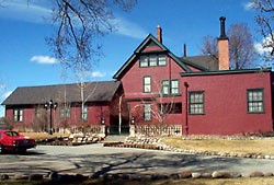 Front view of the larger home that now serves as a private residence.