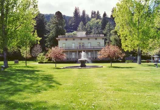 The grand front lawn of the mansion and the grounds, complete with the restructured fountain.