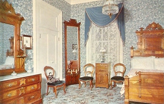 A redecorated room that shows what the inside of the home may have looked like.