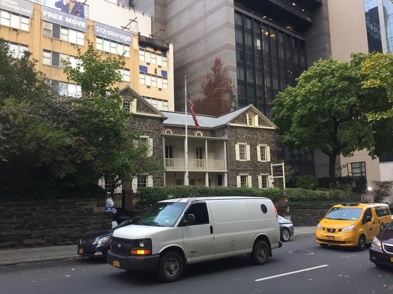 Mount Vernon Hotel Museum and Gardens dwarfed by E 61st St. towers today.