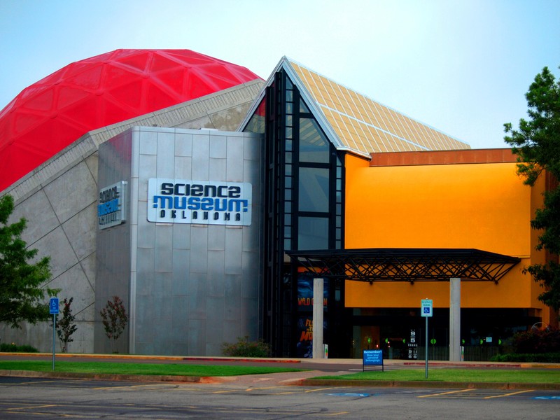 The outside of the building, which changes color in the sunlight.