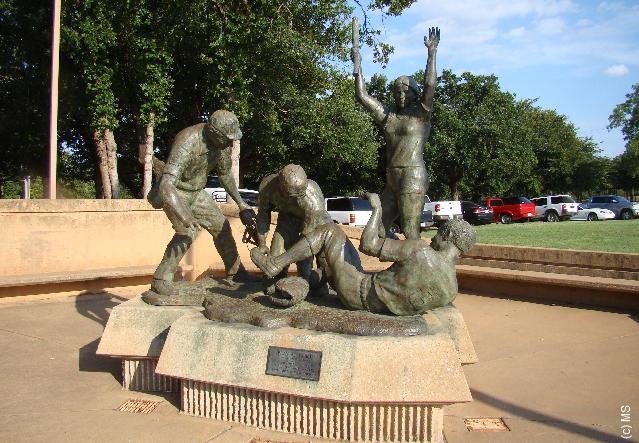 Sculpture in front of the museum that symbolizes the history of the museum.