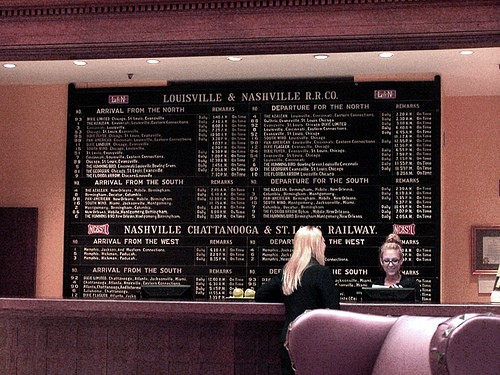 An old Arrivals and Departures board over the lobby desk of the Union Station Hotel