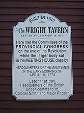 Information plaque from the front of the Tavern