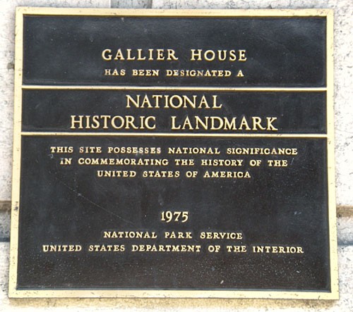 The plaque installed on the outside of the house deeming it a historical landmark.