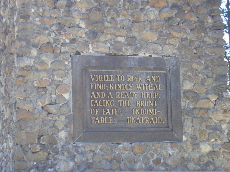 Plaque at base of monument