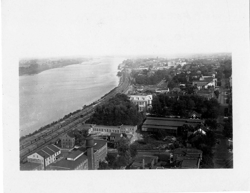 View from Capitol dome looking east showing the area between E. Capitol Ave. and the Missouri River in 1931.  The buildings of Jefferson Landing State Historic Site are visible at the lower left of the image.  Photo courtesy Missouri State Museum.