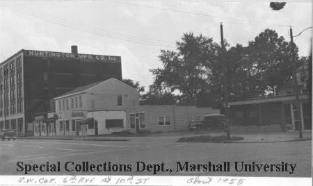 The Huntington Manufacturing Co. building is visible in the background, circa 1955