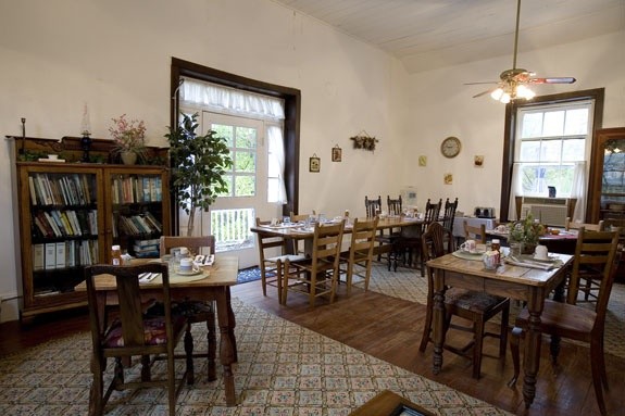 Guests have breakfast in the parlor of the 1861 Vance house