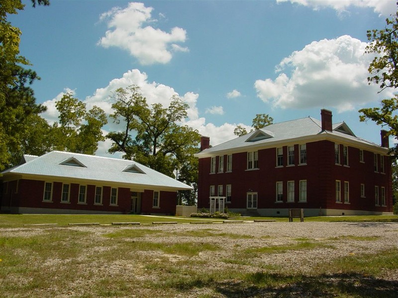 Rear of 1914 Schoolhouse and bath house in back