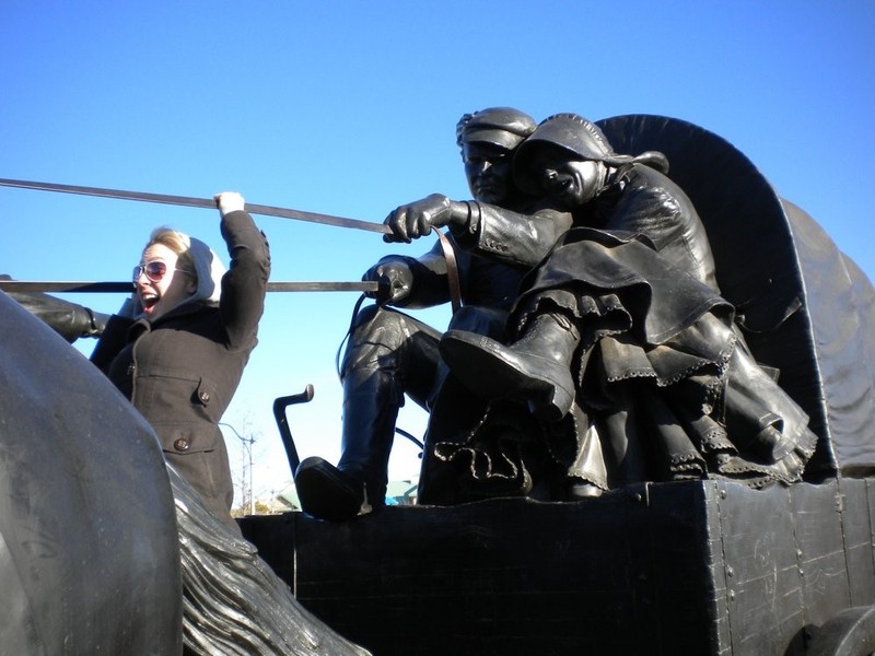 Woman interacting with the sculpture.