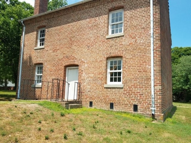 Jail - Built in 1838. This is the third jail in the same location. The first tow were wooden structures that were burned by escaped prisoners.