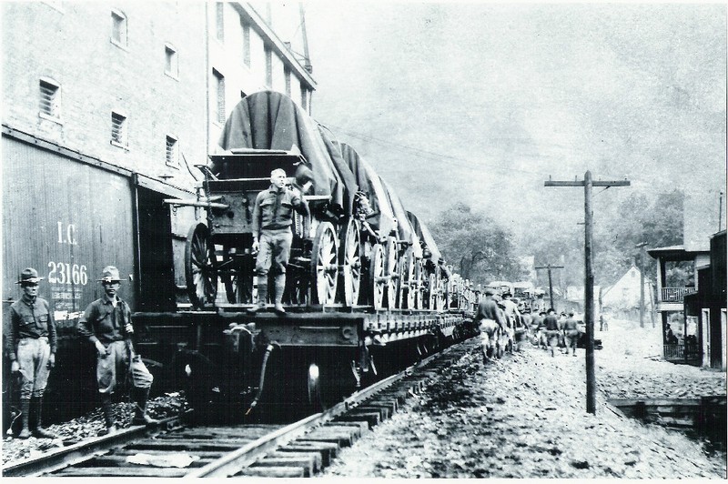 United States military arriving in Logan at the train station during the Mine Wars. 