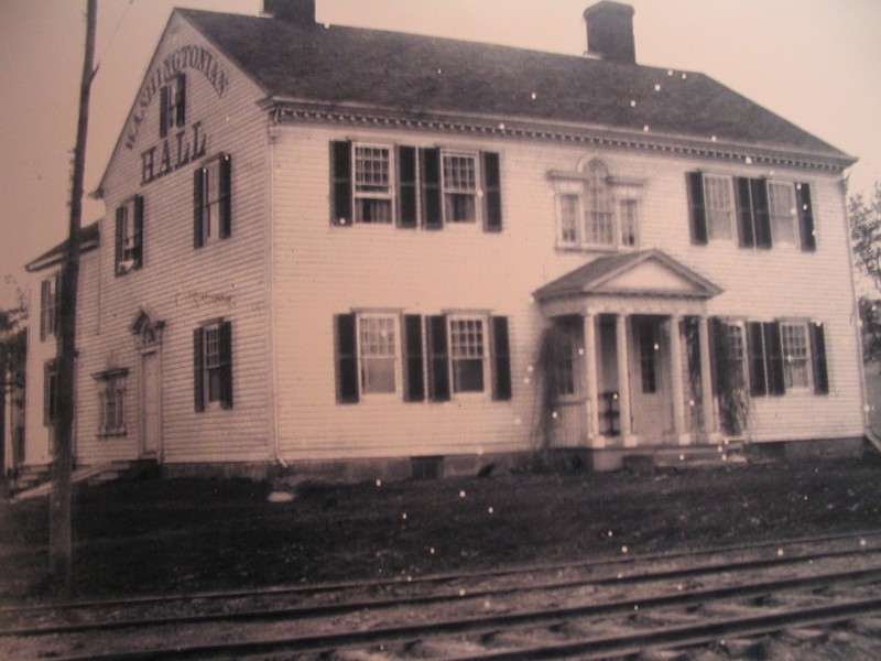 Picture of Washingtonian Hall during the time period when it was used as a Temperance Inn and Trolly Stop