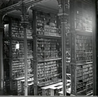 The library employed dozens of pages who retrieved books from these multi-story shelves.