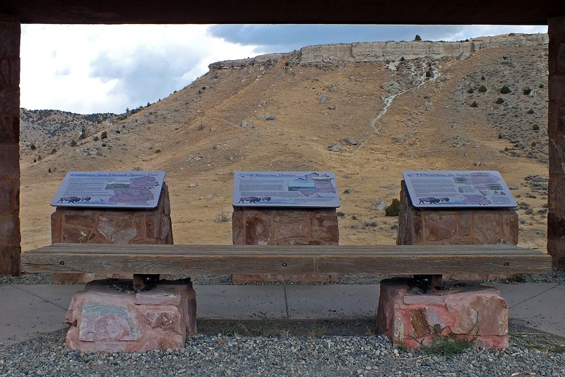 Interpretive displays at the park. The cliff is in the background.